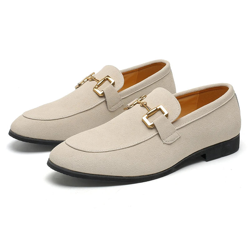 Men's stylish slip-on loafers with metal detail completing a modern smart casual summer outfit.