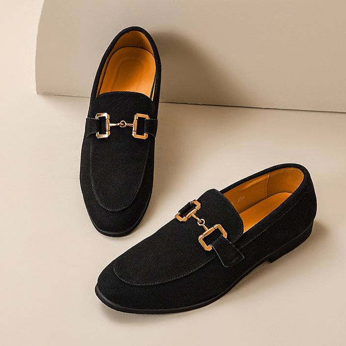 Men's fashion-forward slip-on loafers, boasting a stylish metal detail for a modern & comfortable look.