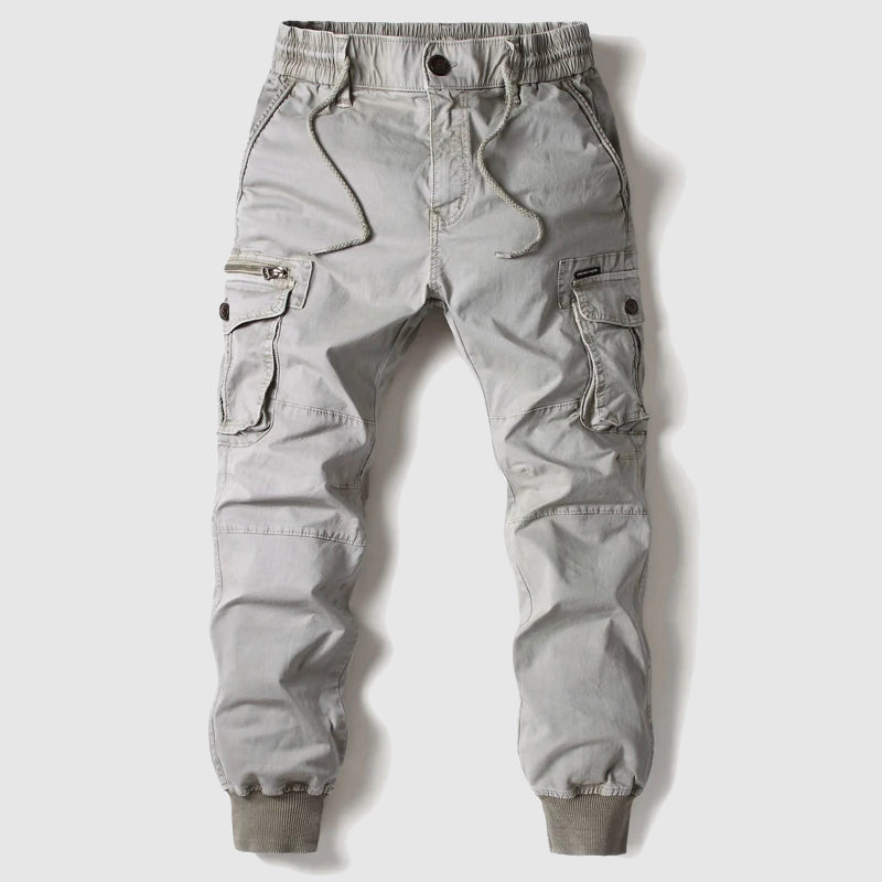 Stylish black men's jogger pants featuring tactical cargo pockets, perfect for modern street style.