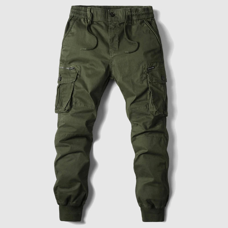 Close-up of men's black tactical cargo jogger pants fabric and pocket detail, showcasing quality.