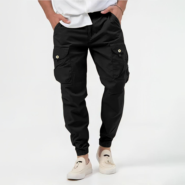 Stylish men's gray cargo pants with an adjustable drawstring waist, perfect for relaxed casual fashion.