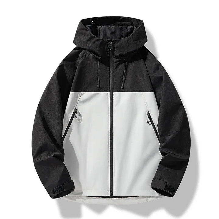 Close-up of the zipper and hood detail on a men's waterproof windproof shell jacket.