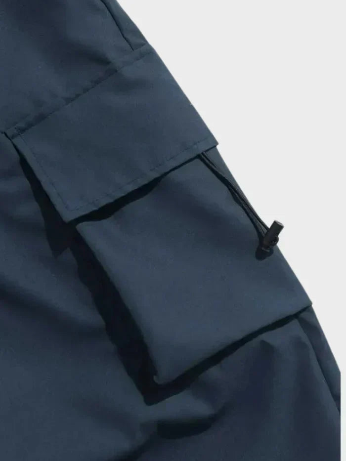 Full length view of men's wide leg cargo pants, offering comfort and a modern streetwear look