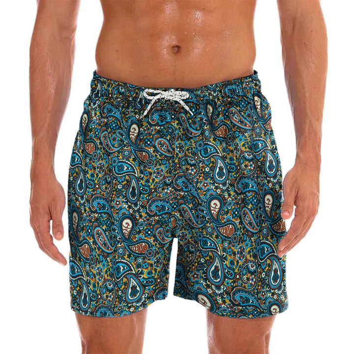 Men's blue paisley print quick-dry swim shorts, ideal for beachwear & summer vacation. Lightweight & comfortable.