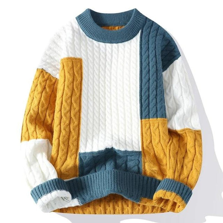 Stylish men's bold color block crew neck sweater. Modern cable knit pullover for a comfortable casual look.