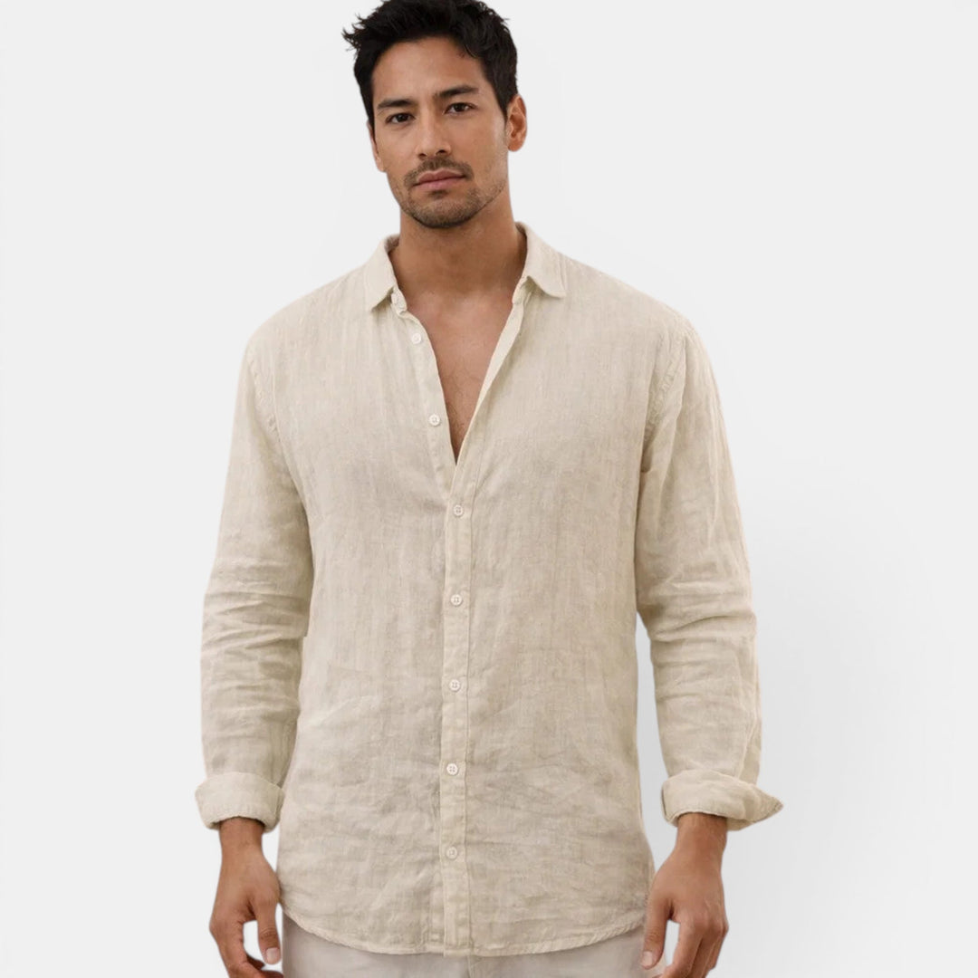 Man wearing a comfortable, breathable men's casual button up shirt for a relaxed summer look.
