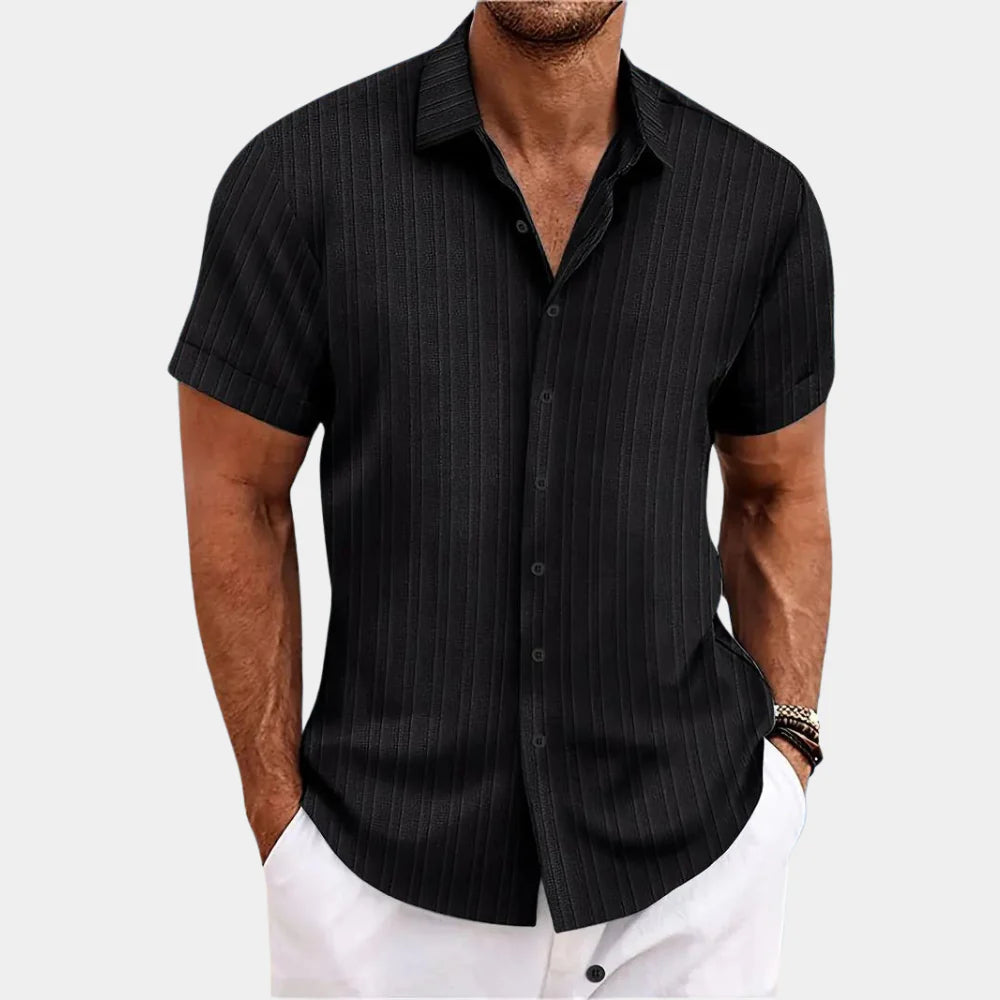 Close-up of the fabric on a men's resilient linen blend button-up shirt, showing its texture.