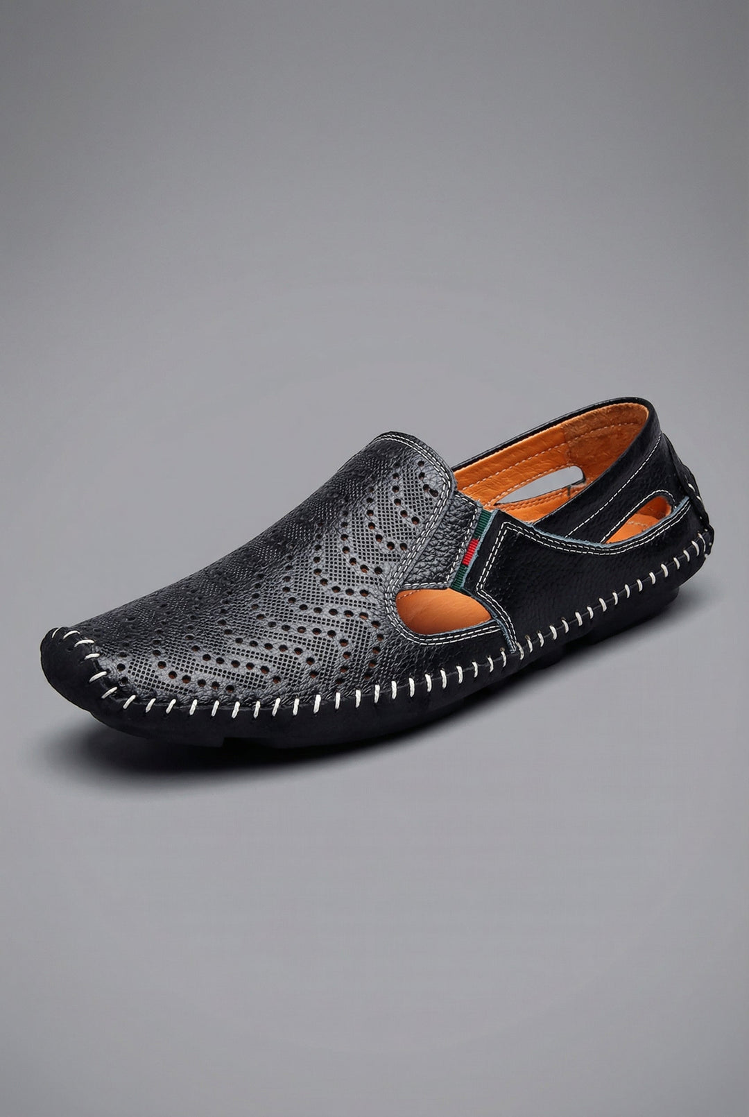 Classic men's navy blue slip-on loafers with subtle stitching, designed for breathable summer comfort.