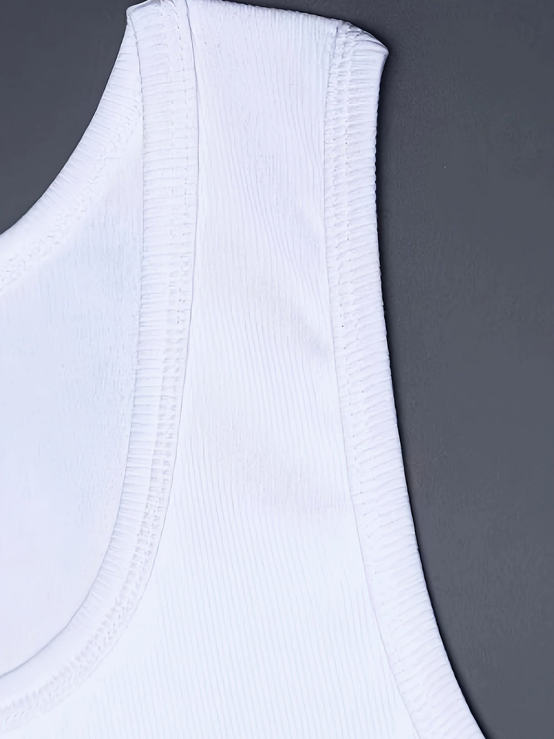Stylish men's activewear tank, offering breathable comfort for summer workouts & daily wear.
