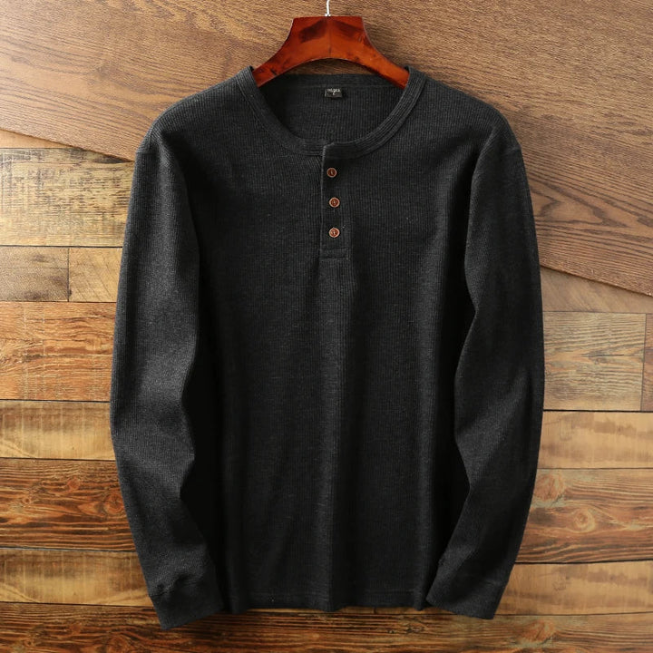 Smart casual men's long sleeve Henley with breathable waffle knit, modern and versatile.