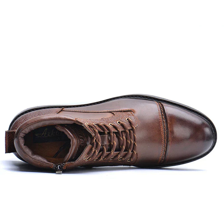 Rugged men's boots with lace-up detail & practical side-zip. Ideal durable footwear for work or casual style.