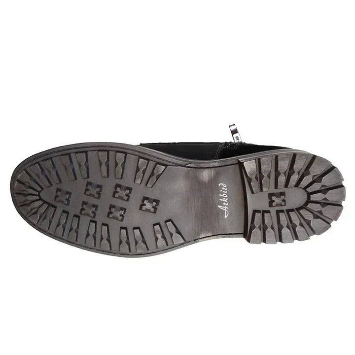 Stylish men's work-inspired boots. Features durable construction, lace-up front, and convenient side-zip.