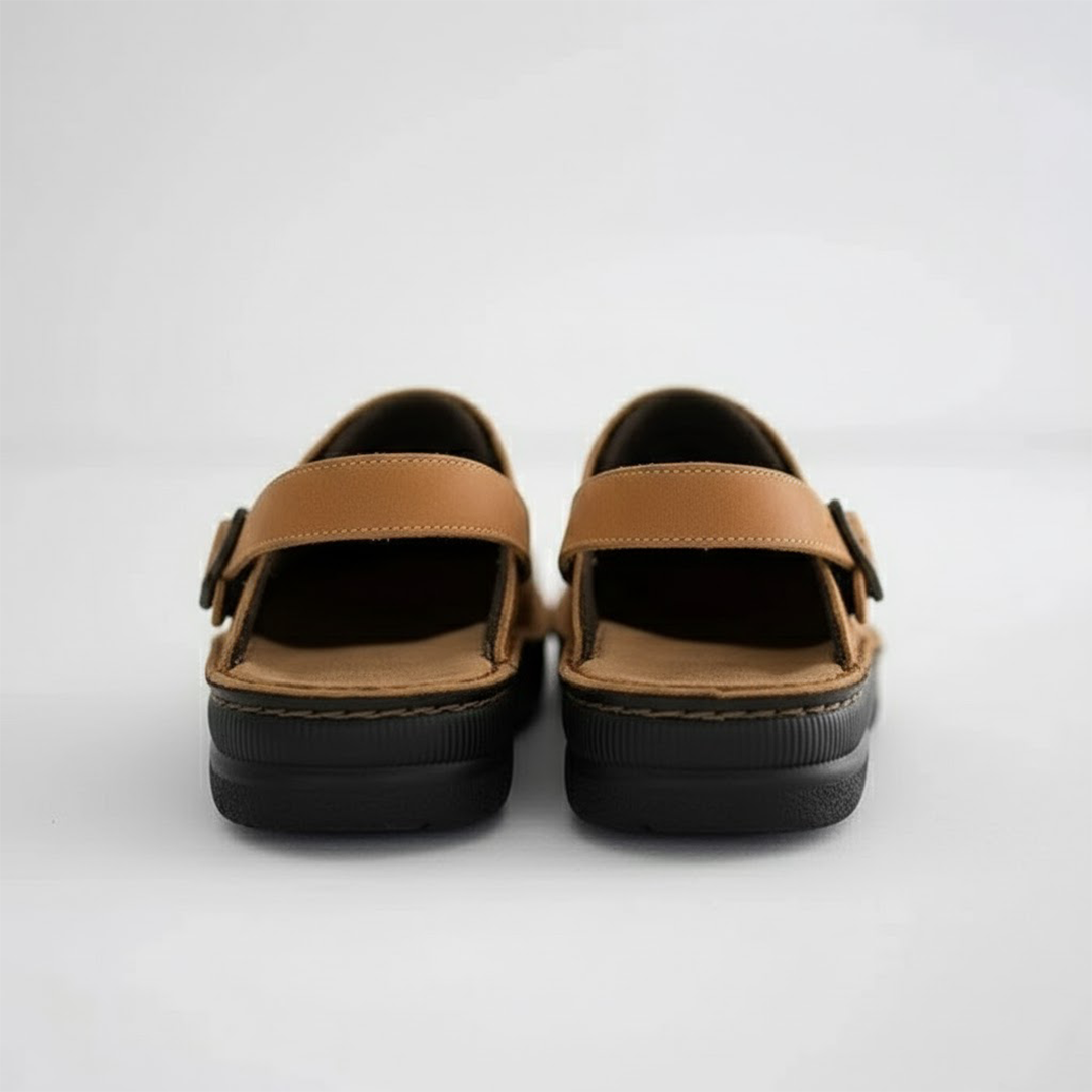 Comfortable men's leather clogs, slip-on style, offering orthopedic support for foot health and durability.