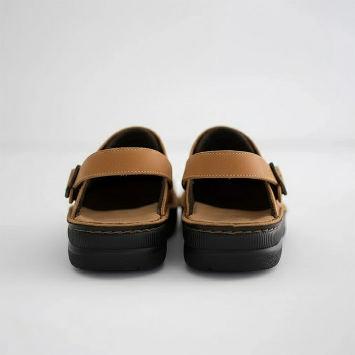 Comfortable men's leather clogs, slip-on style, offering orthopedic support for foot health and durability.
