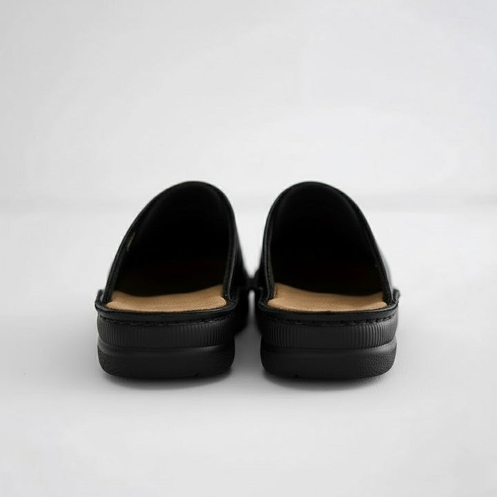 Men's casual leather clogs, slip-on design with orthopedic features for superior comfort and foot wellness.