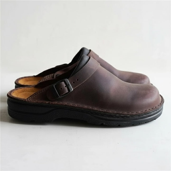 Stylish brown leather clogs for men, offering orthopedic benefits and a convenient slip-on fit for daily wear.