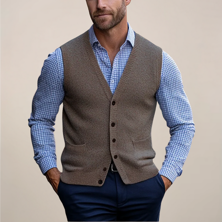 Men's buttoned knit sweater vest in a soft spring green hue, perfect for layering and smart casual outfits.