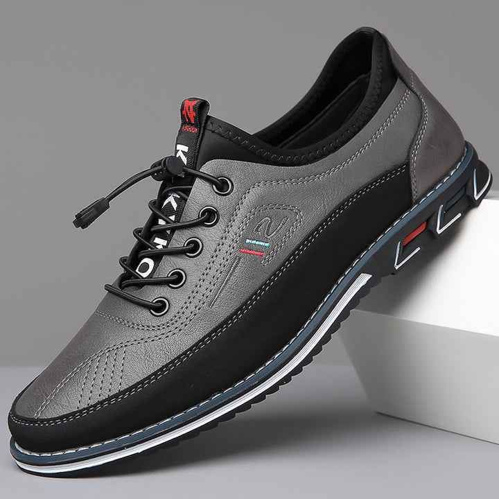 Pair of Men's Barefoot Oxford Style Lace-Up Shoes, front view, ready for adventure.