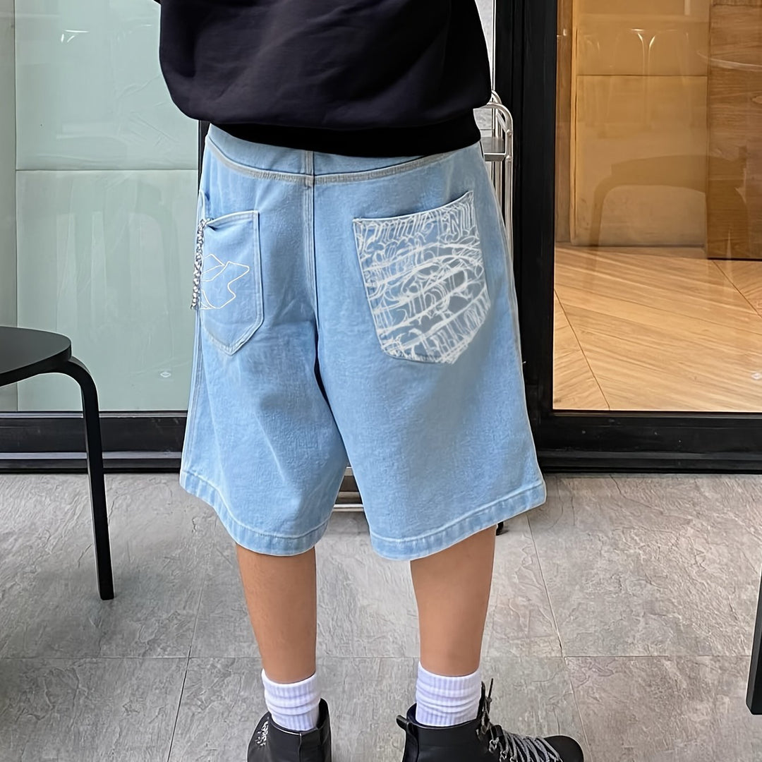 Relaxed fit men's denim Bermuda shorts, comfortable for summer, featuring elegant floral embroidery.