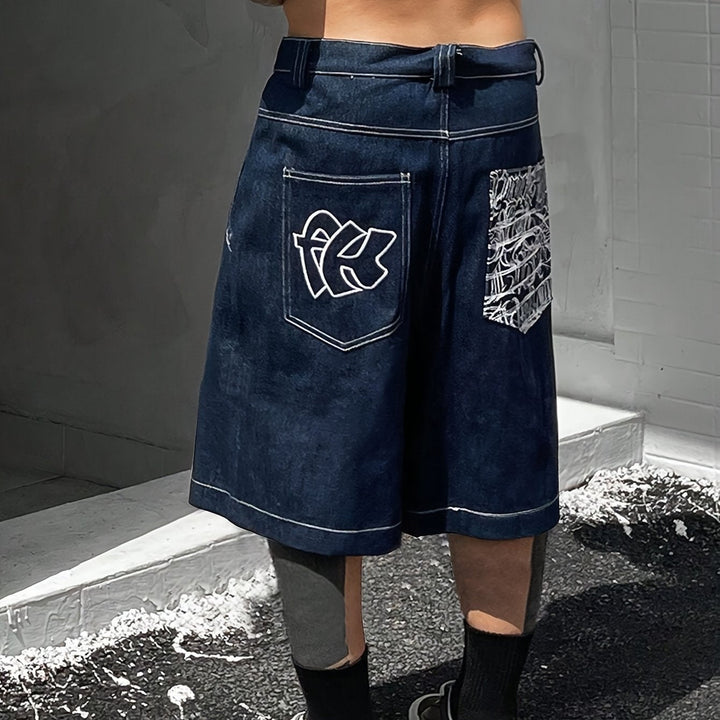 Summer essential: Men's loose fit Bermuda denim shorts with stylish floral embroidery. Casual & comfortable.
