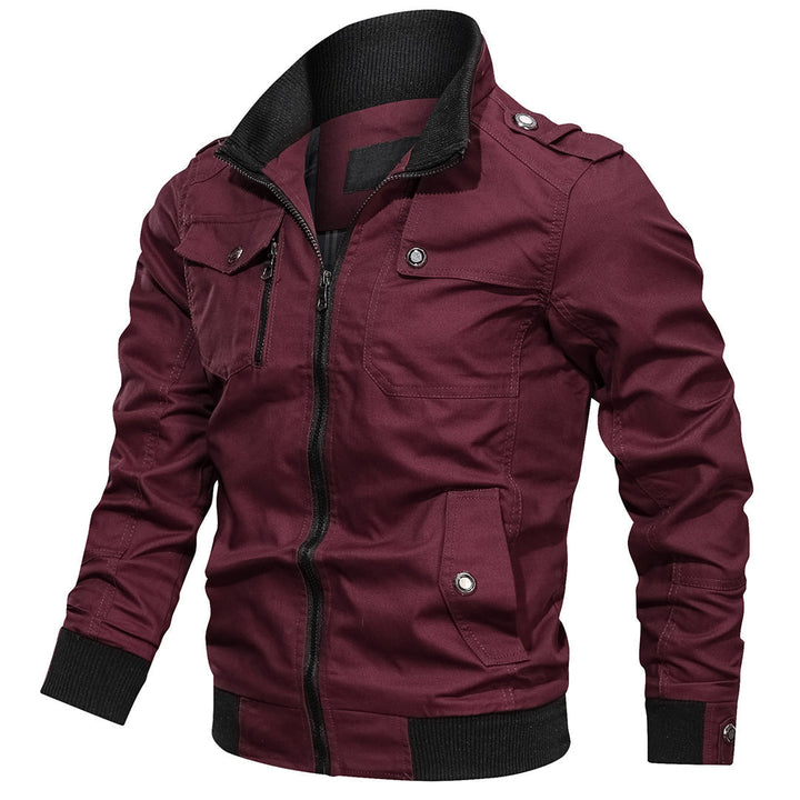 Lightweight men's outdoor jacket, zip-up with ribbed cuffs, styled for comfortable casual wear.