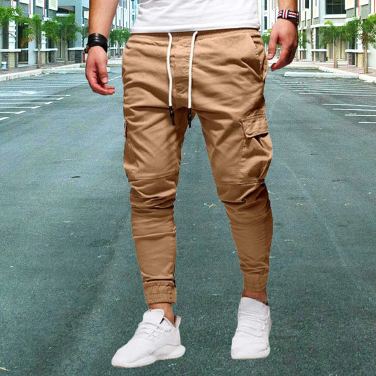 Utility men's cargo pants with secure flap pockets, perfect for essentials. Comfortable and durable for active wear.