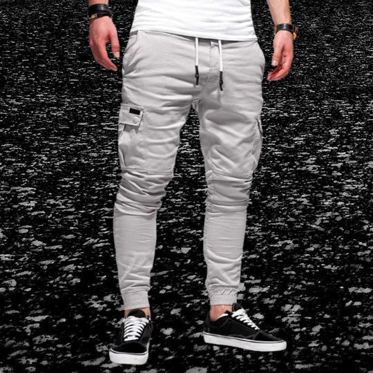 Classic men's casual cargo pants with convenient flap pockets. Designed for comfort, utility, & relaxed fit.