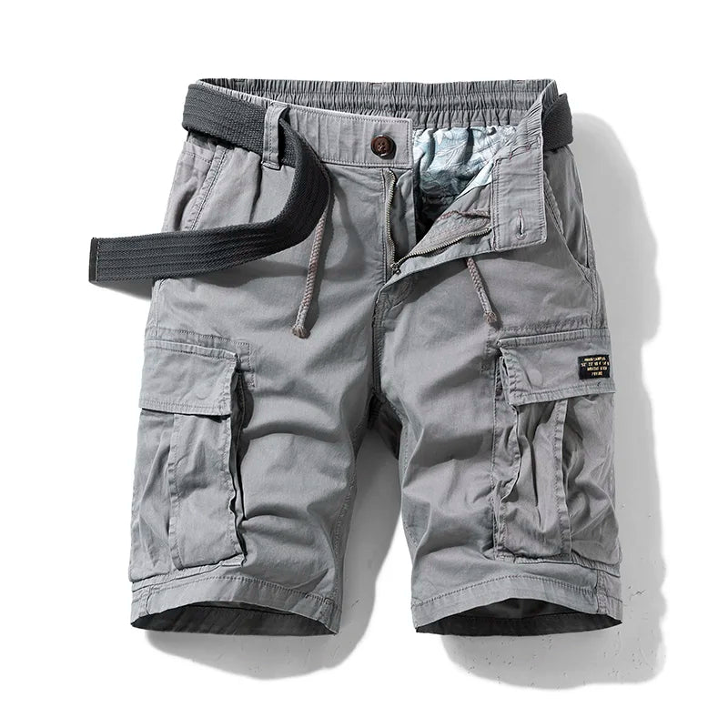 Khaki men's relaxed fit utility cargo shorts with drawstring waist for warm weather style.