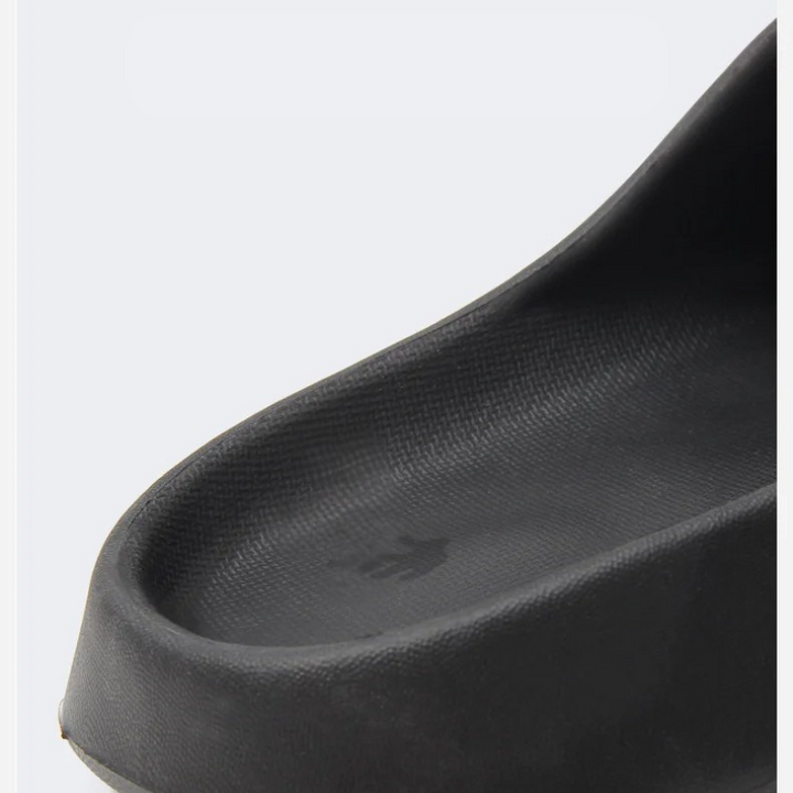 Modern men's slip-on slippers, ergonomic comfort for casual indoor outdoor footwear & loungewear.