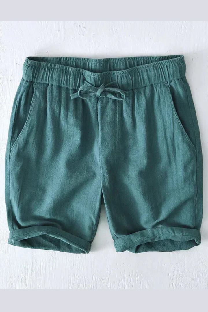 Everyday men's knee-length casual shorts with elastic waist, drawstring, and side pockets. Summer fashion.