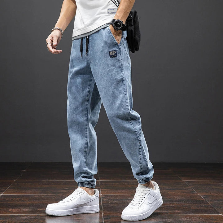 Men's casual jogger jeans with drawstring waist, modern fit for comfortable summer wear