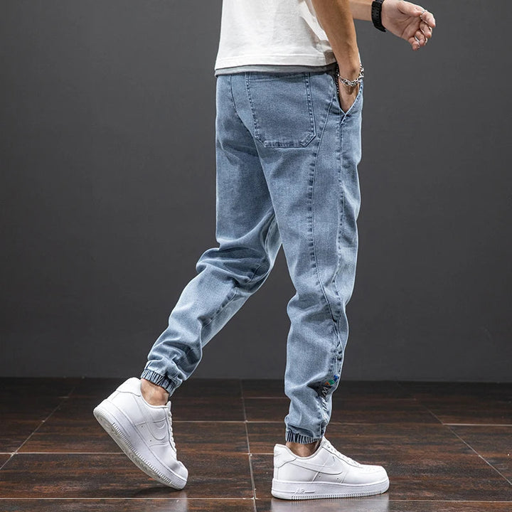 Blue men's jogger jeans with adjustable drawstring, comfortable and trendy summer apparel