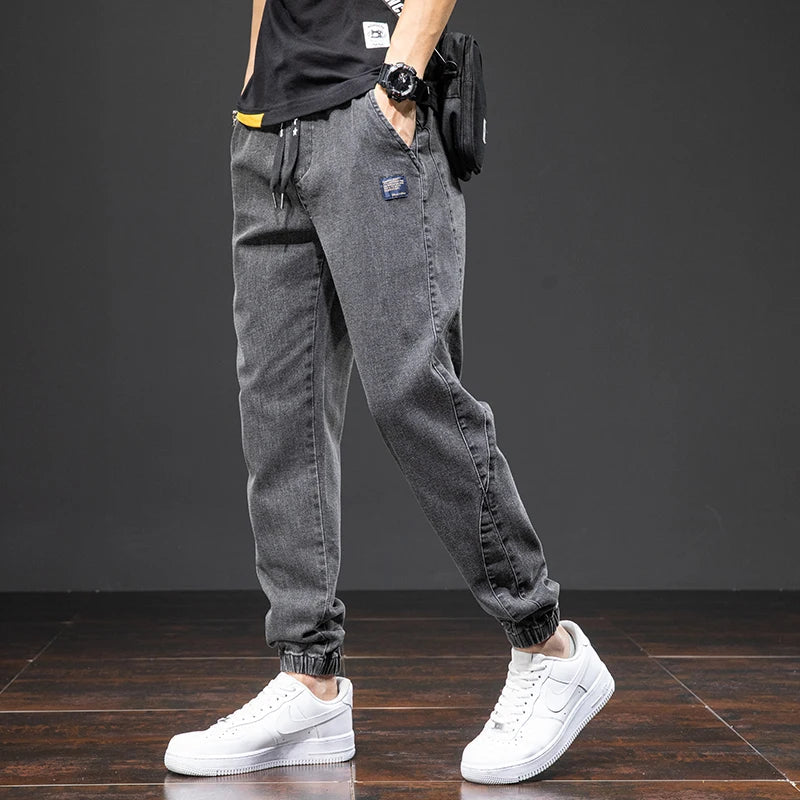 Comfortable men's drawstring jogger jeans, versatile bottoms for a modern casual look