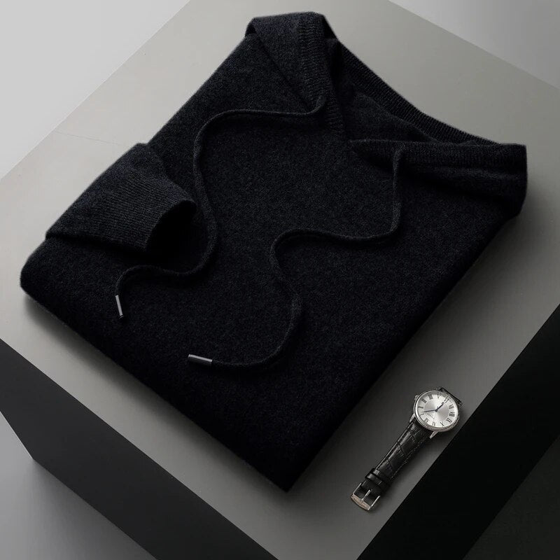 Fashionable men's knit hoodie sweater. Pullover design with drawstring, great for casual comfort.