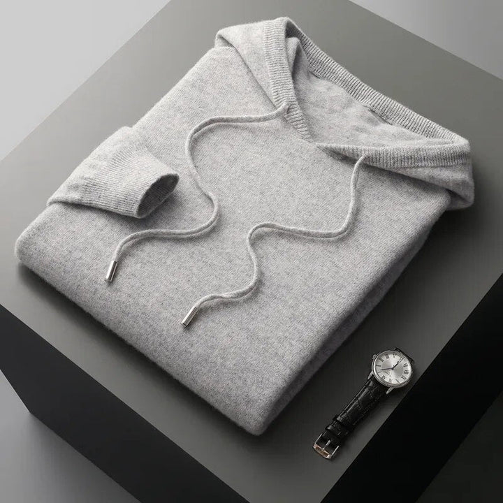 Warm men's knit sweater hoodie. Casual long sleeve pullover with drawstring for comfort.