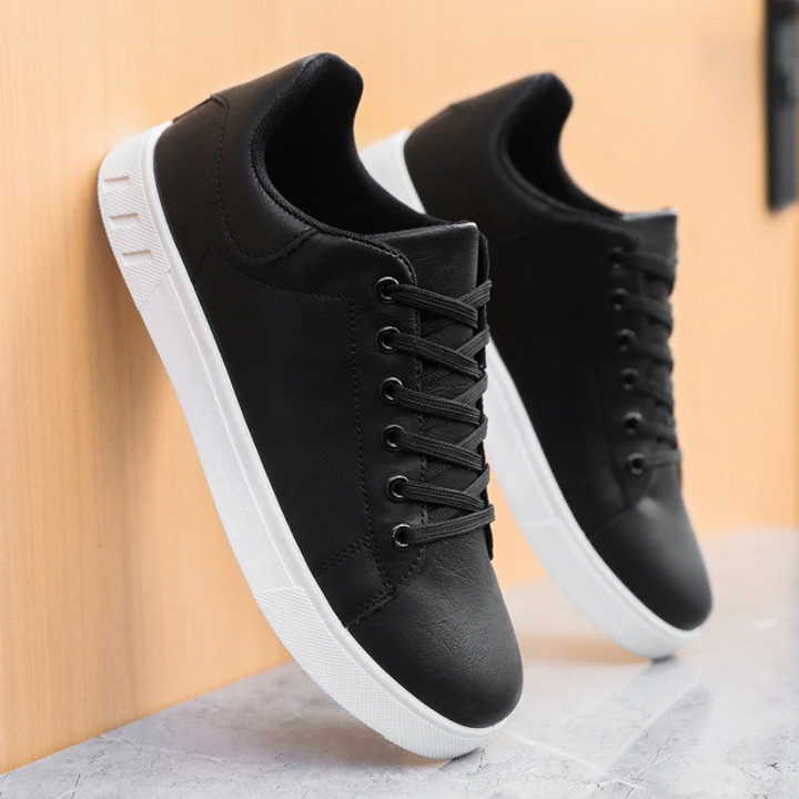 Top-down view of men's street sneakers, showcasing the full lace-up design and modern footwear aesthetic.