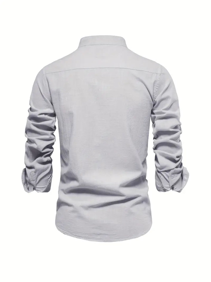 Men's casual long sleeve button-down shirt paired with trousers, demonstrating spring apparel style.