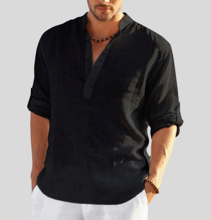 Relaxed fit men's long sleeve shirt in white with button placket, essential for summer and everyday style