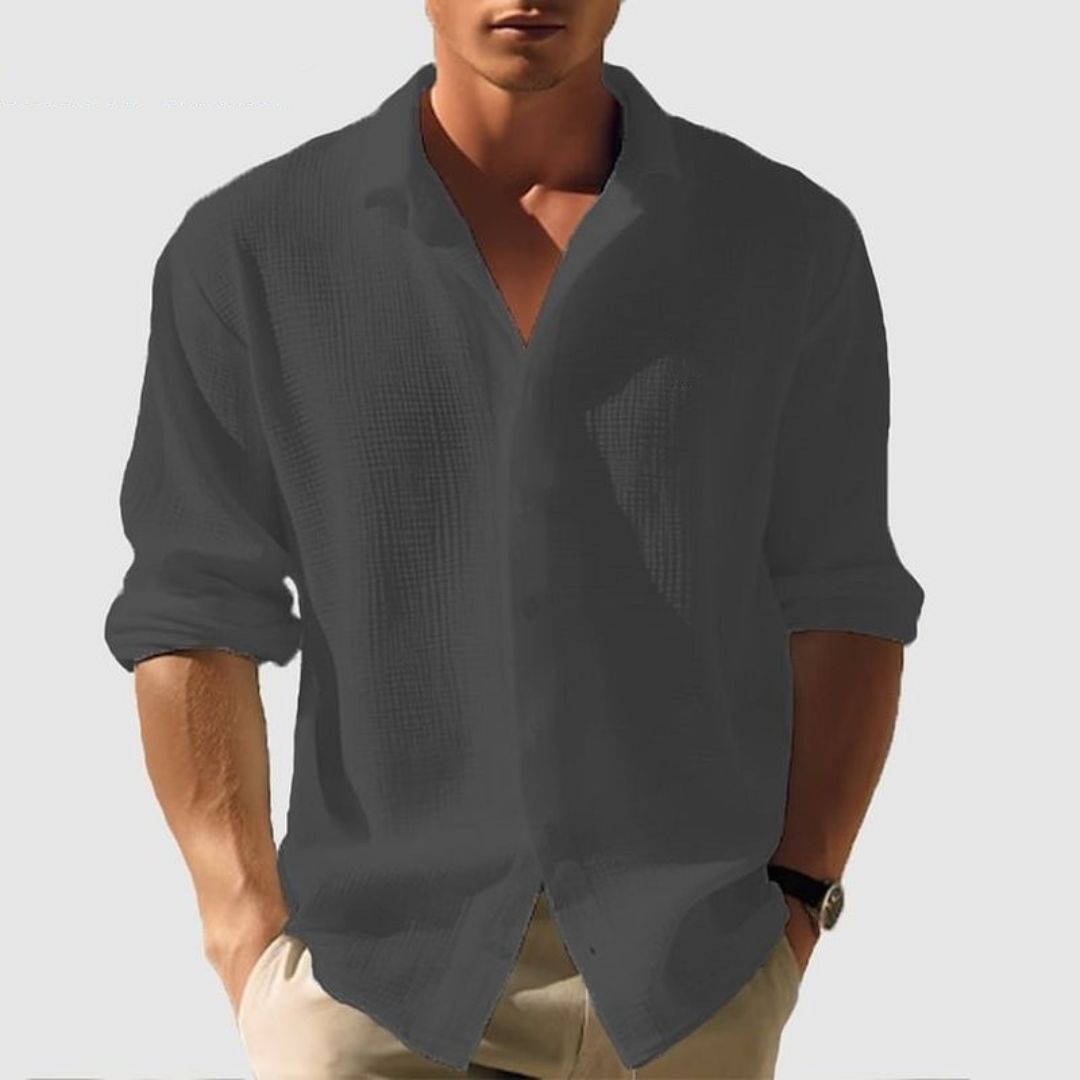 Close-up of men's textured waffle knit long sleeve shirt, perfect for casual and versatile everyday outfits.