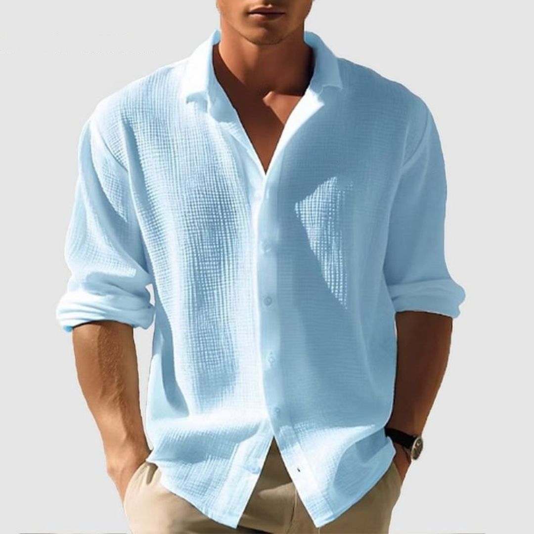 Comfortable men's long sleeve waffle shirt. Stylish casual button-up with textured fabric for versatile everyday looks.