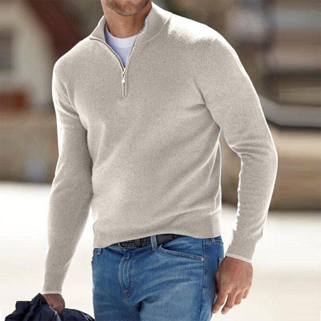 Close-up of a versatile men's zip neck sweater with textured knit fabric