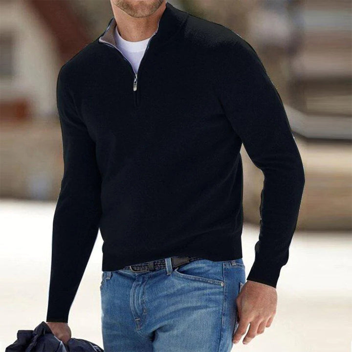 Man in a brown zip neck sweater, showcasing versatile and comfortable men's everyday apparel