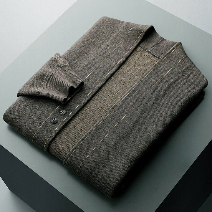 Full length view of a men's plaid button-front cardigan, a key piece for modern men's fall fashion.