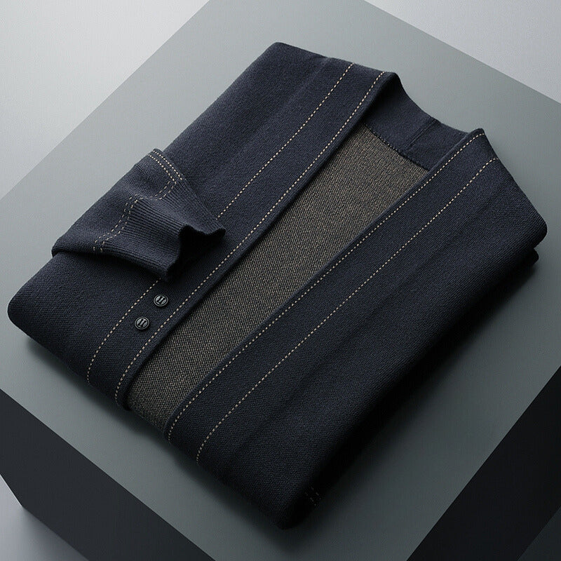 Textured fabric detail of a men's soft plaid cardigan, highlighting the quality of this casual sweater.