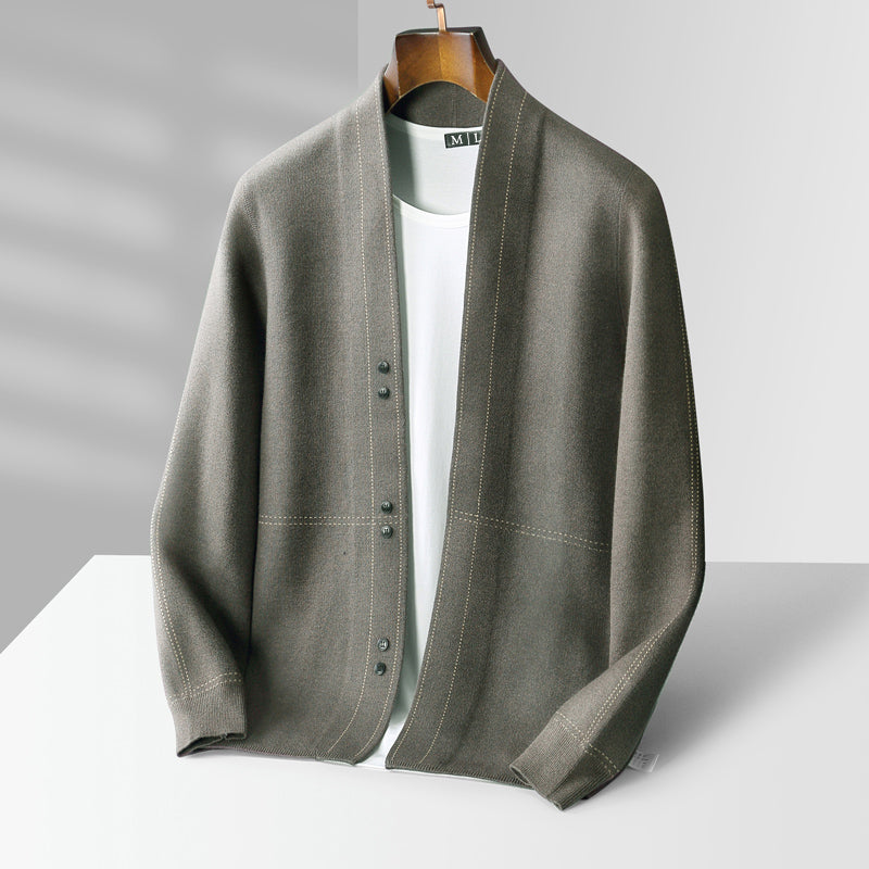 Detail shot of the functional button-front closure on a versatile men's long sleeve plaid cardigan.