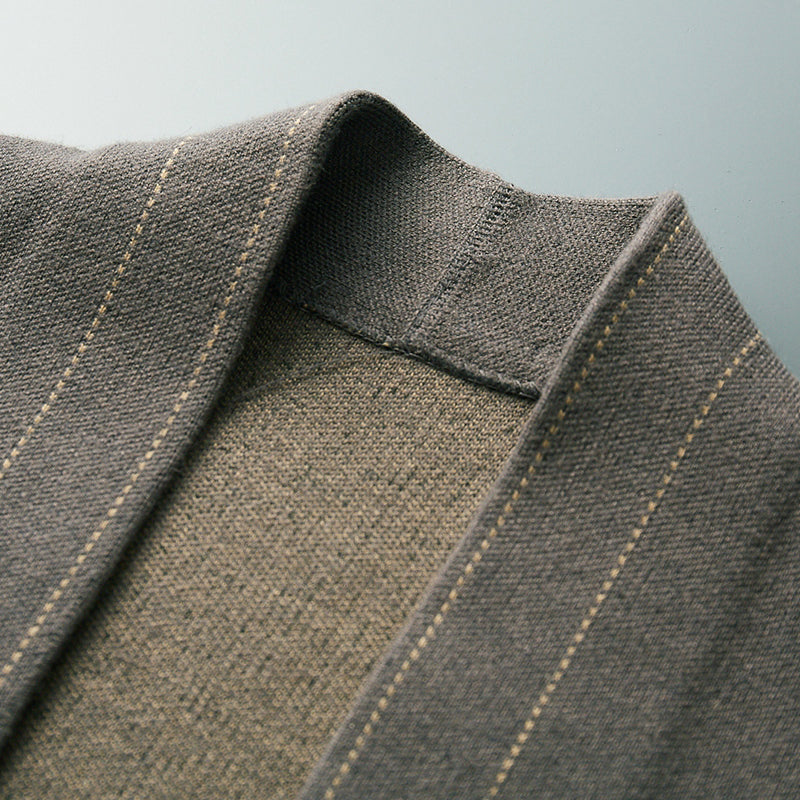 Side view of a men's long sleeve plaid cardigan, featuring a classic button-front design for fall fashion.