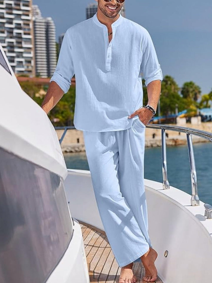Men's casual polyester lounge shirt and shorts set in blue, perfect for summer wear.
