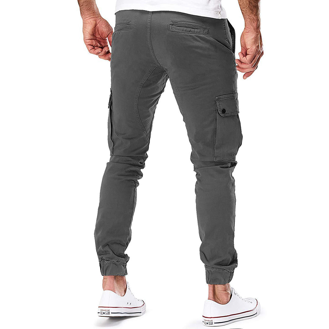Stylish men's cargo pants, relaxed fit, black, showing side pockets and drawstring waist