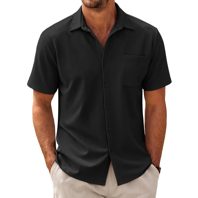 Relaxed fit men's summer shirt, solid color, short sleeve, with a chest pocket, ideal for casual wear.