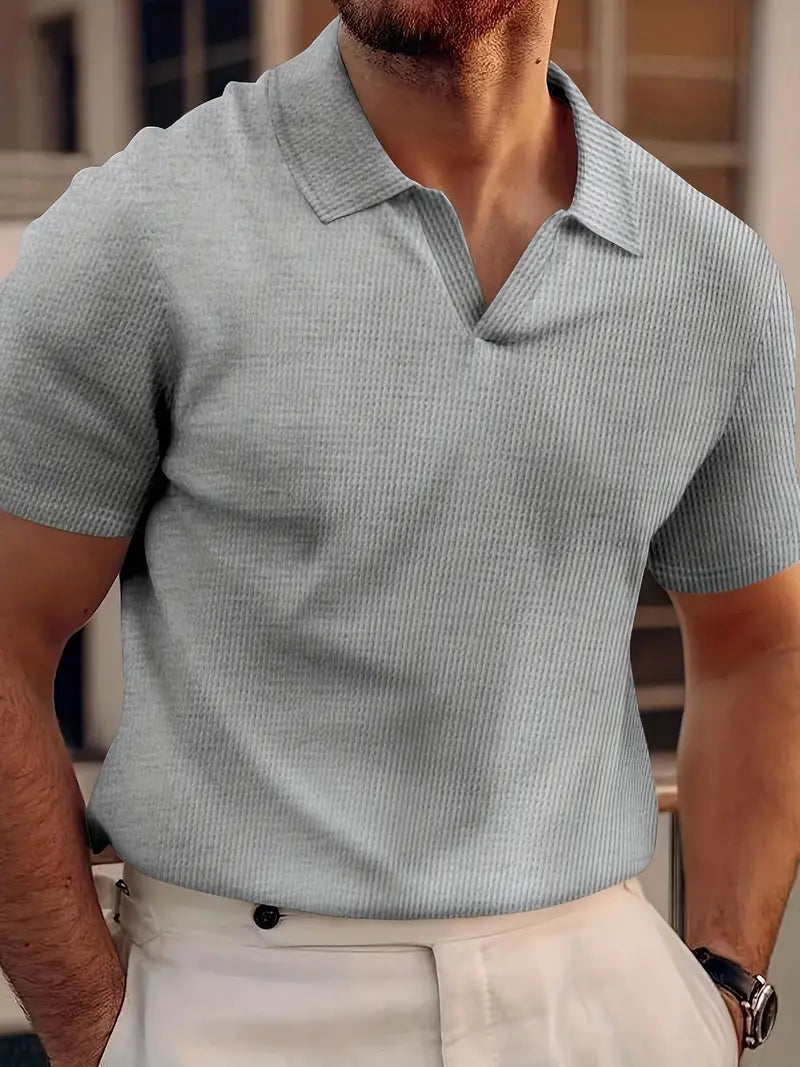 Stylish men's short-sleeve polo shirt for a modern casual look & smart-casual occasions.